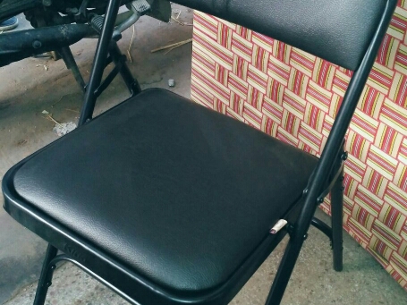 Folding black chair post image