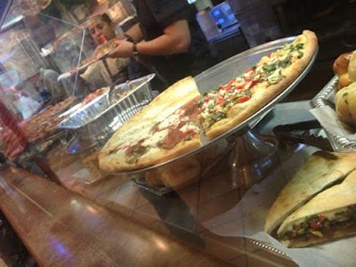Photos of A Slice Of The Pie Pizza