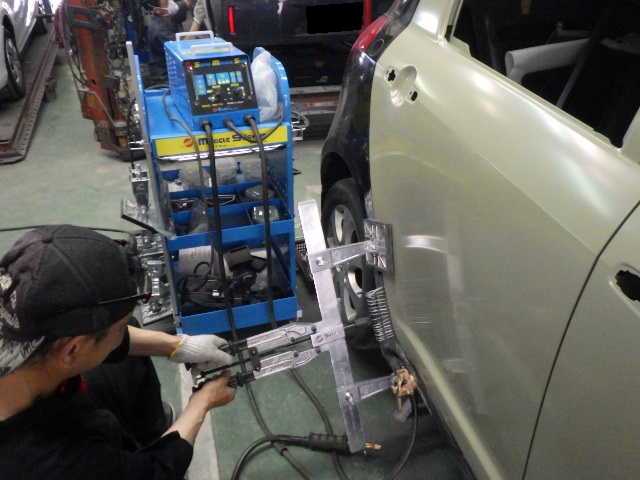 （有）米沢自動車