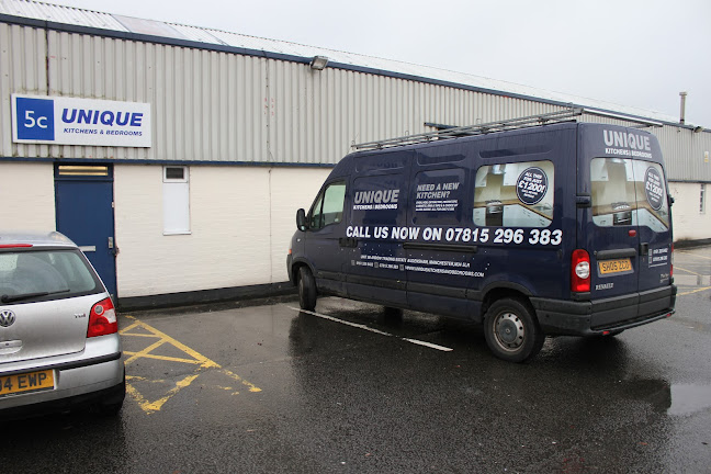 Unique Kitchens and Bedrooms Phone number