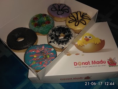Photos of Donat Madu