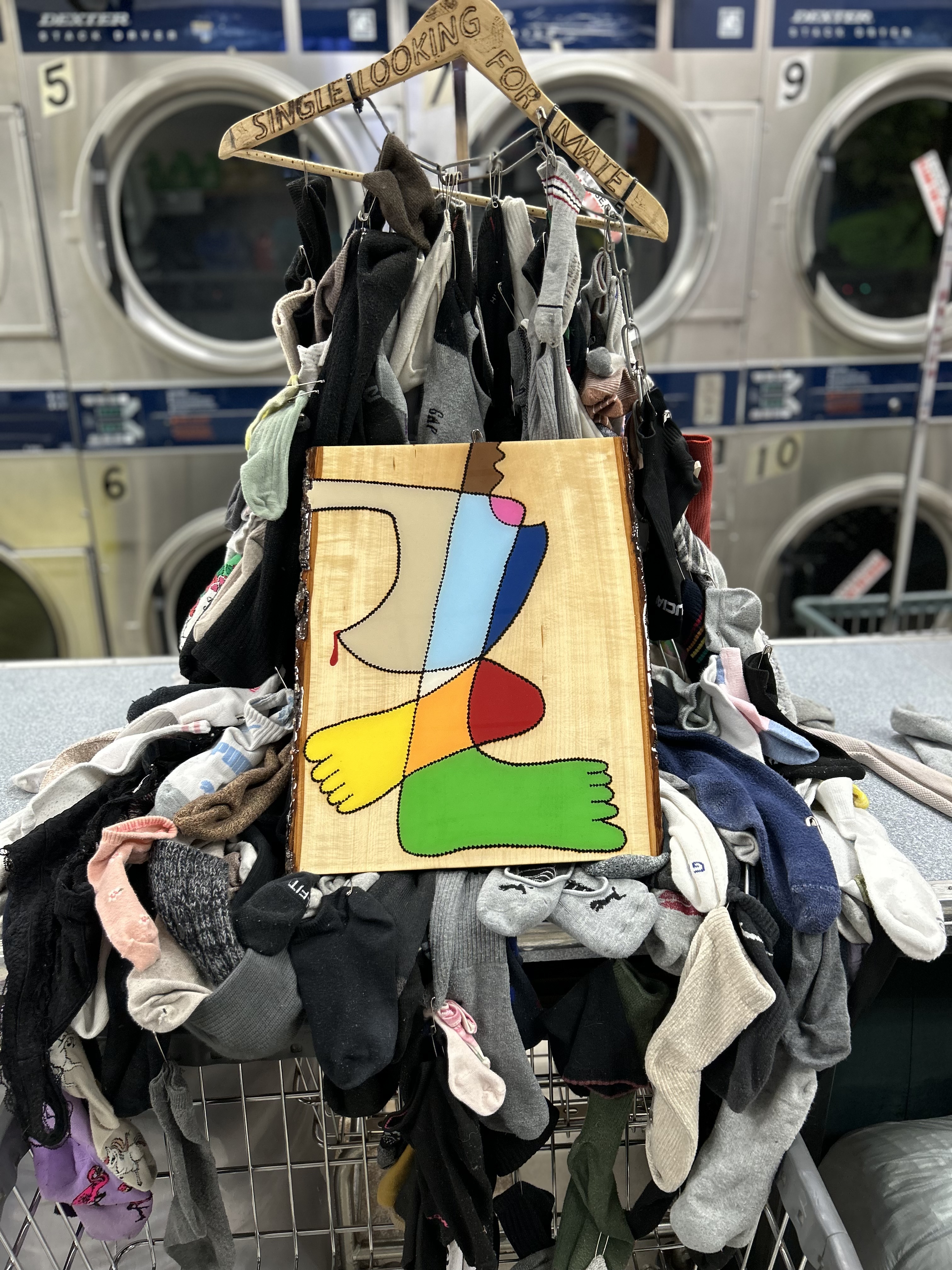 Clean laundry equipment at Si Laundromat in Brooklyn, NY