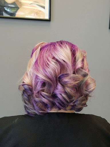New Reflections Salon LLC & Tanning