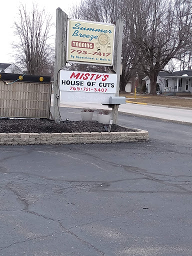 Misty's House of Cuts Logo