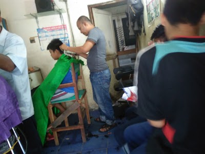 Photos of pangkas Rambut " MAKHMUN II "