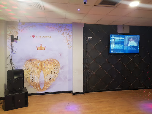 E M Lounge and Night Club Logo