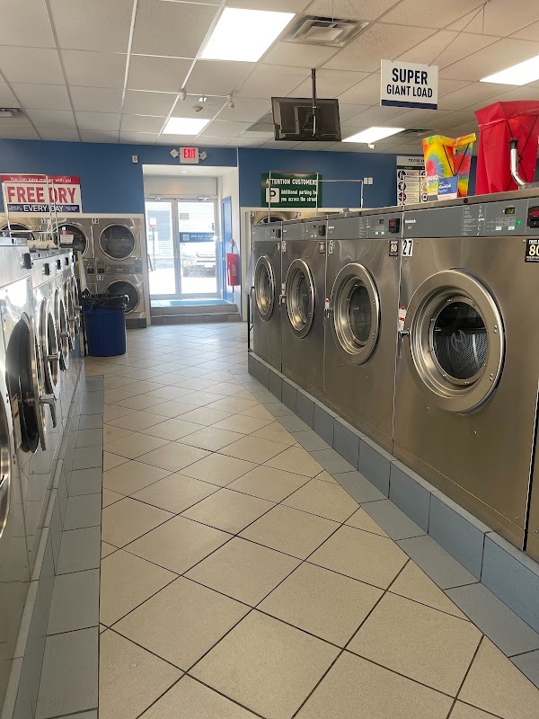 Clean laundry equipment at Laundromax in Lowell, MA