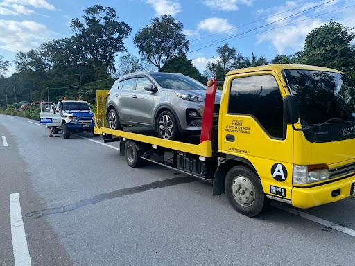 TOM AUTOWORKS TOWING LAWAS