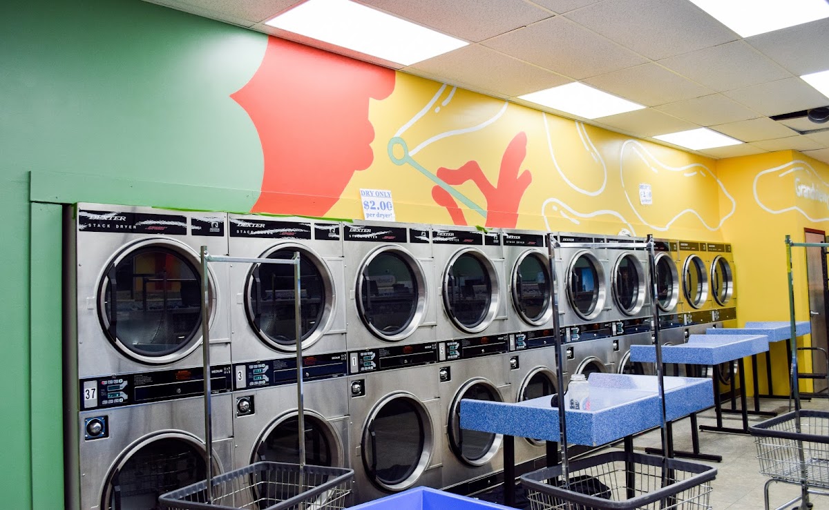 Clean laundry equipment at Grandview Coin Laundry in Kansas City, MO