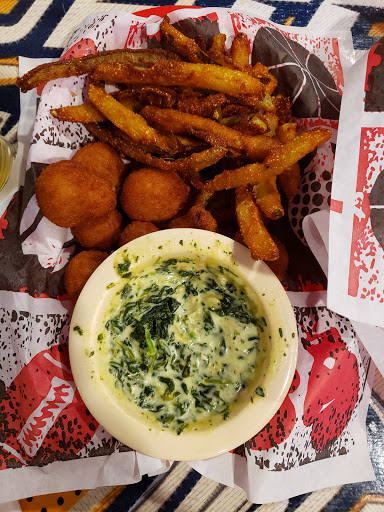 Migos sports bar and grill Gallery - United States
