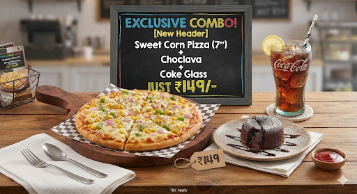 One small sweetcorn pizza one chocolava cake and 250ml coke glass post image