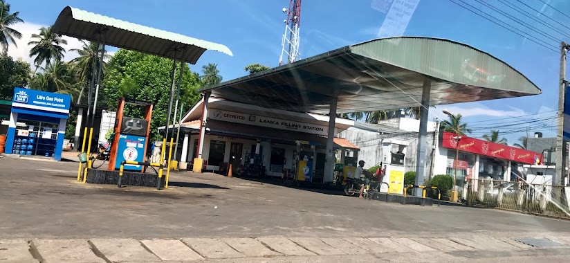 Wennappuwa Petrol Station, Author: Sukumal Harischandra