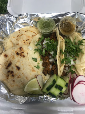 Lobos Tacos Y Pupusas by null