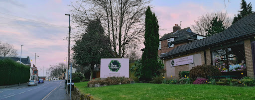 W. Lewis Florist Logo
