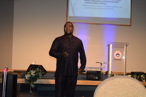 The Gospel Faith Mission International House of Restoration Logo