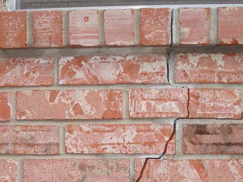 Exterior brick crack resulting from soil movement