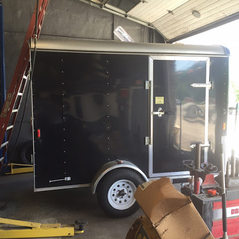 B. H. Trailers and Plows