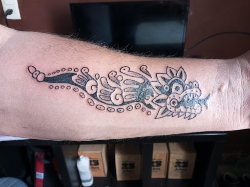 Tatuajes y perforaciones Yahuitl