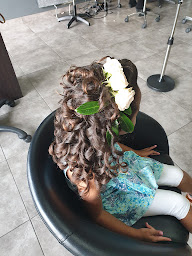 Photo n°13 de Mille et Une Coiffe à Saint-Pierre (Salon de coiffure)