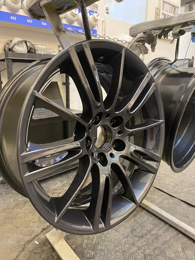 Powder coat wheels Ltd Logo