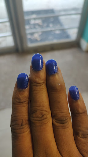 Exotic Nails LLC Logo