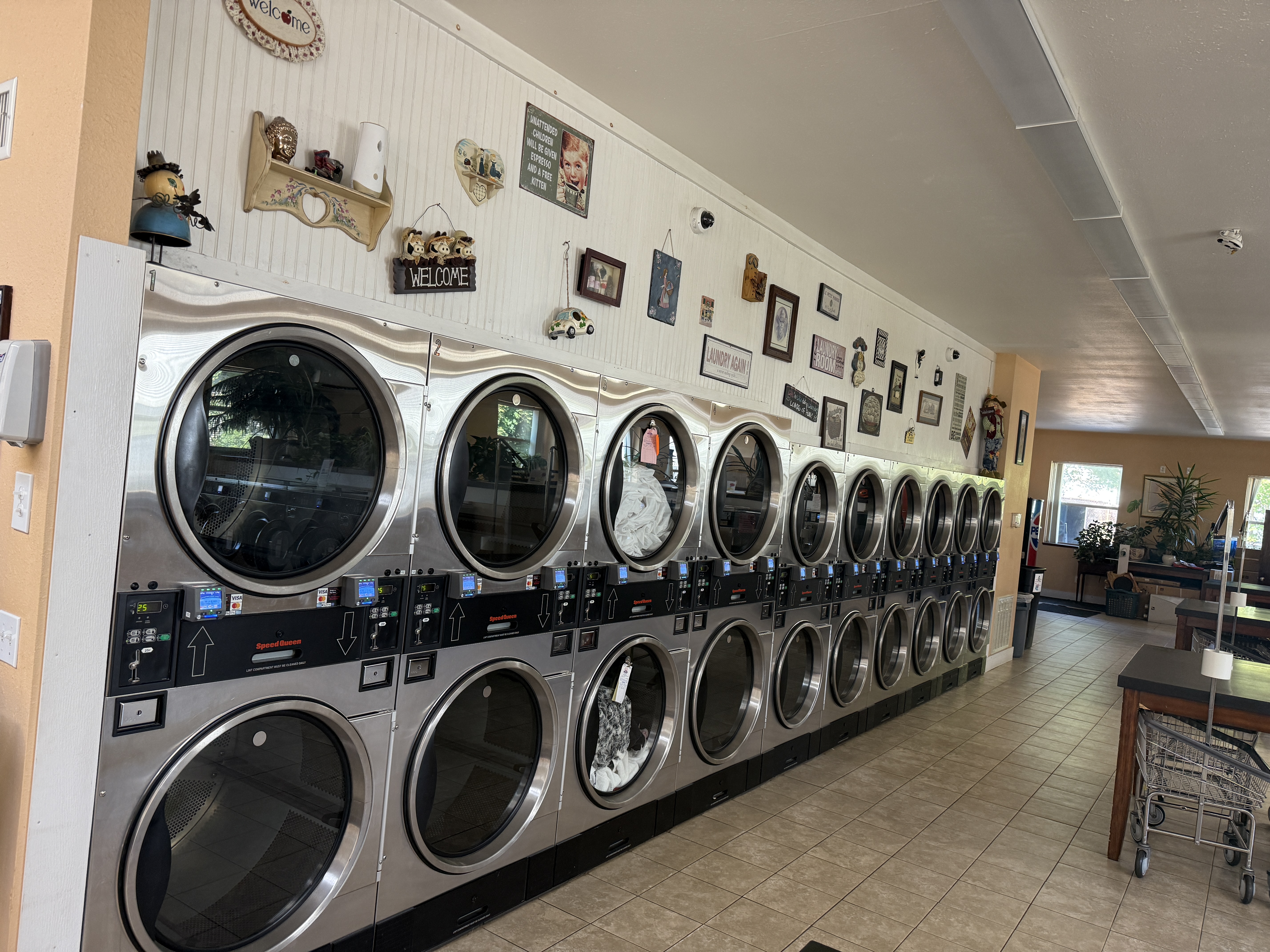 Booms Laundry storefront and entrance in Biddeford