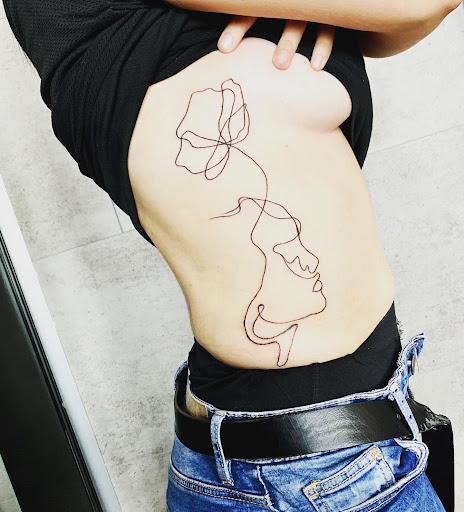 Le Trait Noir Tatouage - Piercing - Créations artistiques - Thumbnail