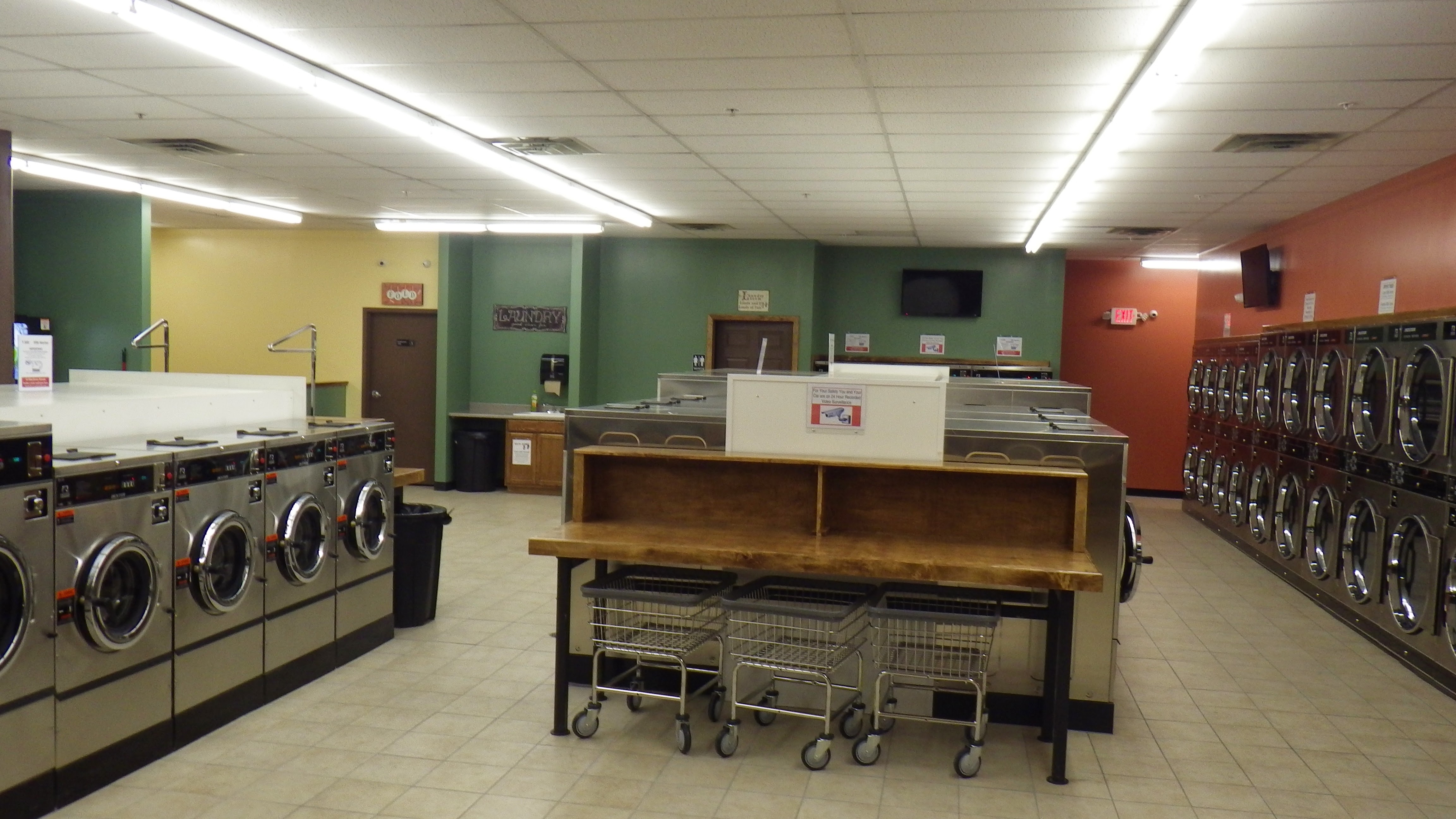 Clean laundry equipment at Top Shelf Laundromat and Wash-n-Fold in Depew, NY