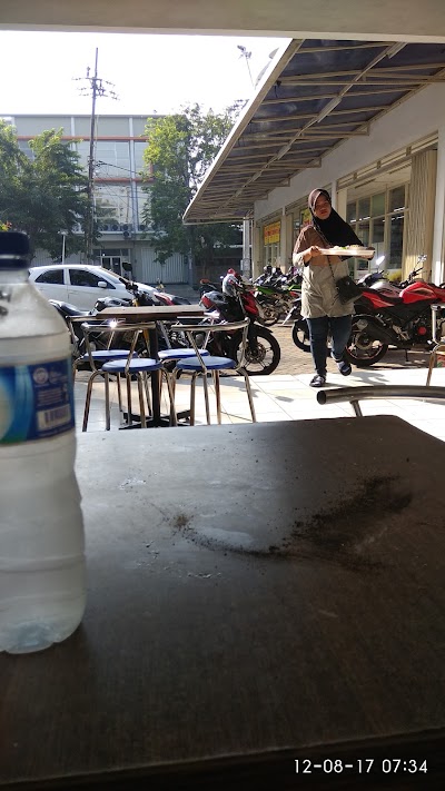 Photos of Indomaret Plus Dharmahusada Utara