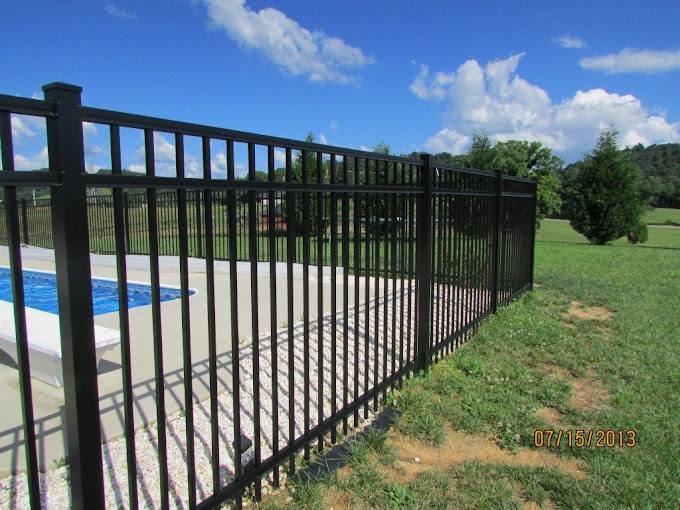 modern aluminum fence installed in Naples