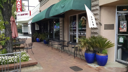 Grinds Vines and Automobilia Cafe Inc