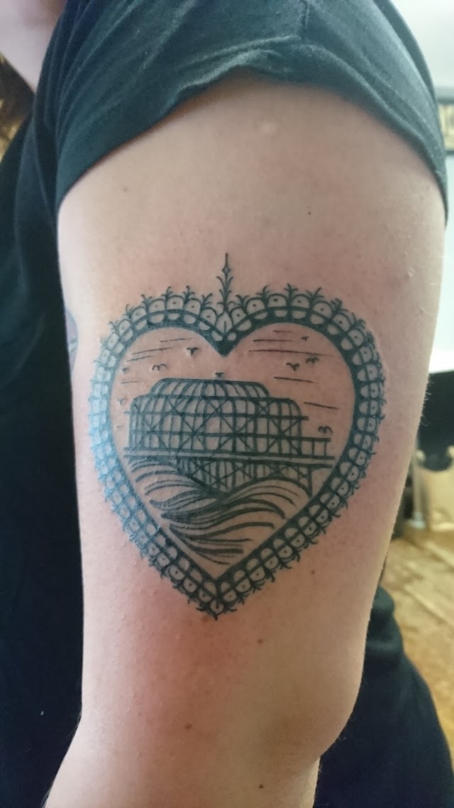 Magnum Opus Tattoo