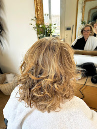 Photo n°12 de Coiffure Corinne Relooking à Reims (Magasin de vêtements)