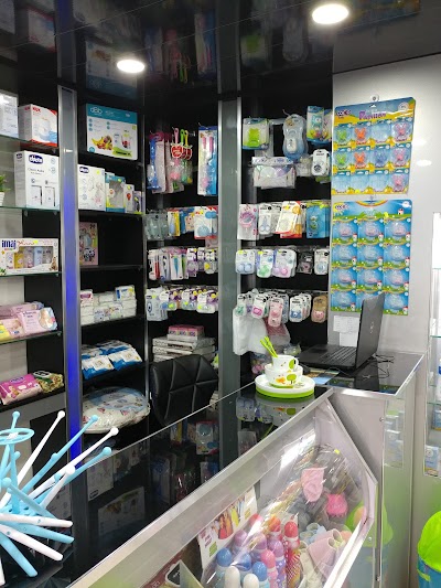 Photos of baby shop لوازم الرَّضيع