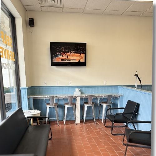 Highlander Laundromat facility with washing machines in Middleborough