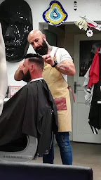 Photo n°16 de TUFAN GÜNCAN à Saint-Brice-Courcelles (Salon de coiffure)