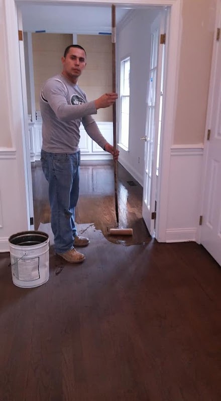 Valle Hardwood Floors LLC laundromat interior in Bridgeport, CT