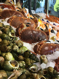 Photo n°40 de Pierrot Coquillages Kiosque, Restaurant, Livraison de fruits de mer & Poissons à Marseille (Marché aux poissons et fruits de mer)