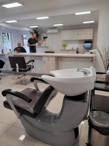 Salon fryzjerski ""POD BRZYTWĄ"" Bogusław Sotomski