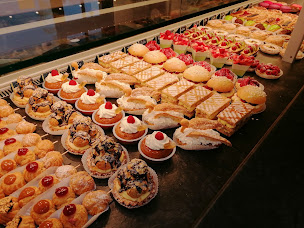 Photo n°54 de Boulangerie pâtisserie Gilbert Christophe et Patricia à Rouillon (Boulangerie)