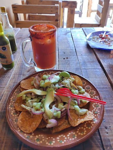 Tostadas y micheladas El Rancho Logo