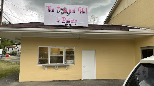 The Donut Hut & Bakery LLC Logo