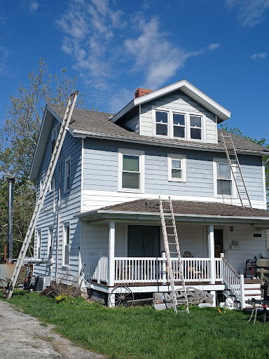 Exteriors Unlimited Roofing Siding and Remodeling Services Logo