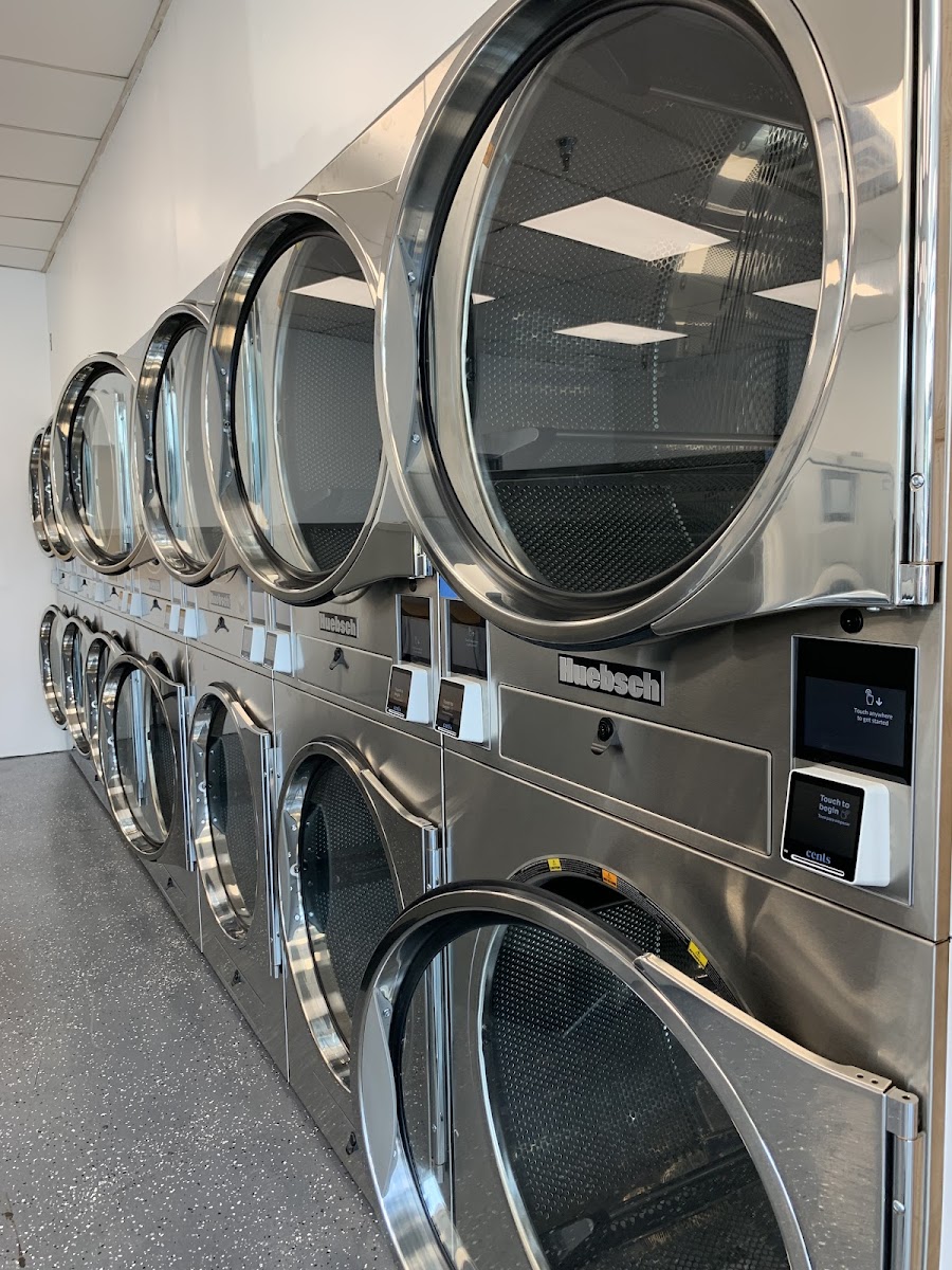 Clean laundry equipment at The Clean Machine Laundromat in Seattle, WA