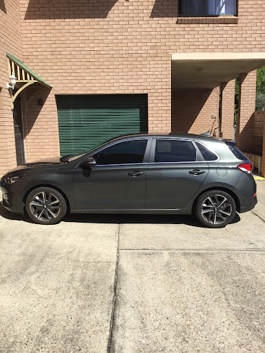 Wow Factor Car Washing and Detailing Logo