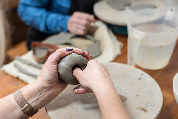 Hot Pot Pottery pottery studio in Near offering wheel throwing and hand building classes