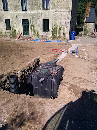 Photo n°7 de Paulic TP Assainissement/Terrassement/Aménagement extérieur/Enrobé Revêtement sol/Baud/Morbihan/Pontivy/Lorient/Vannes à Baud (Société de travaux publics)