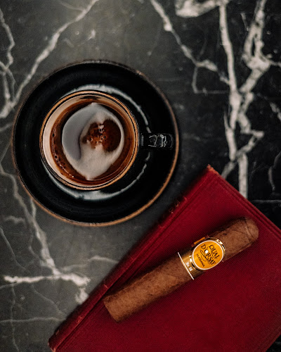 Tomtom Cigars & Coffee Phone number