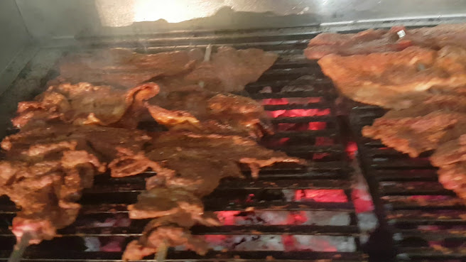 Alhaji SUYA Peckham by null