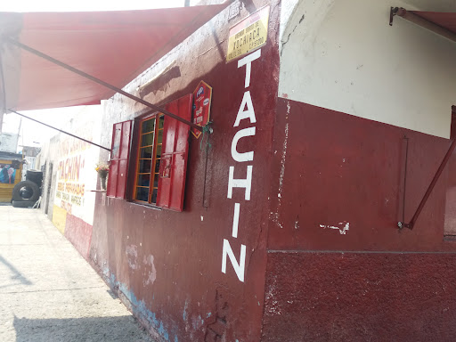 Vinos y licores "TACHIN" Logo